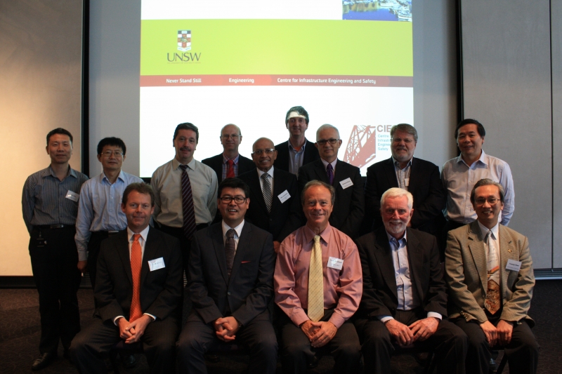 L to R Back Row: A/Prof Wei Gao; Prof Chongmin Song; A/Prof Alex Remennikov; Dr Stephen Hicks; Adj. Prof Wije Ariyaratne; Prof Mark Stewart; Richard Hitch; Prof Ian Gilbert; Prof Hong Hao